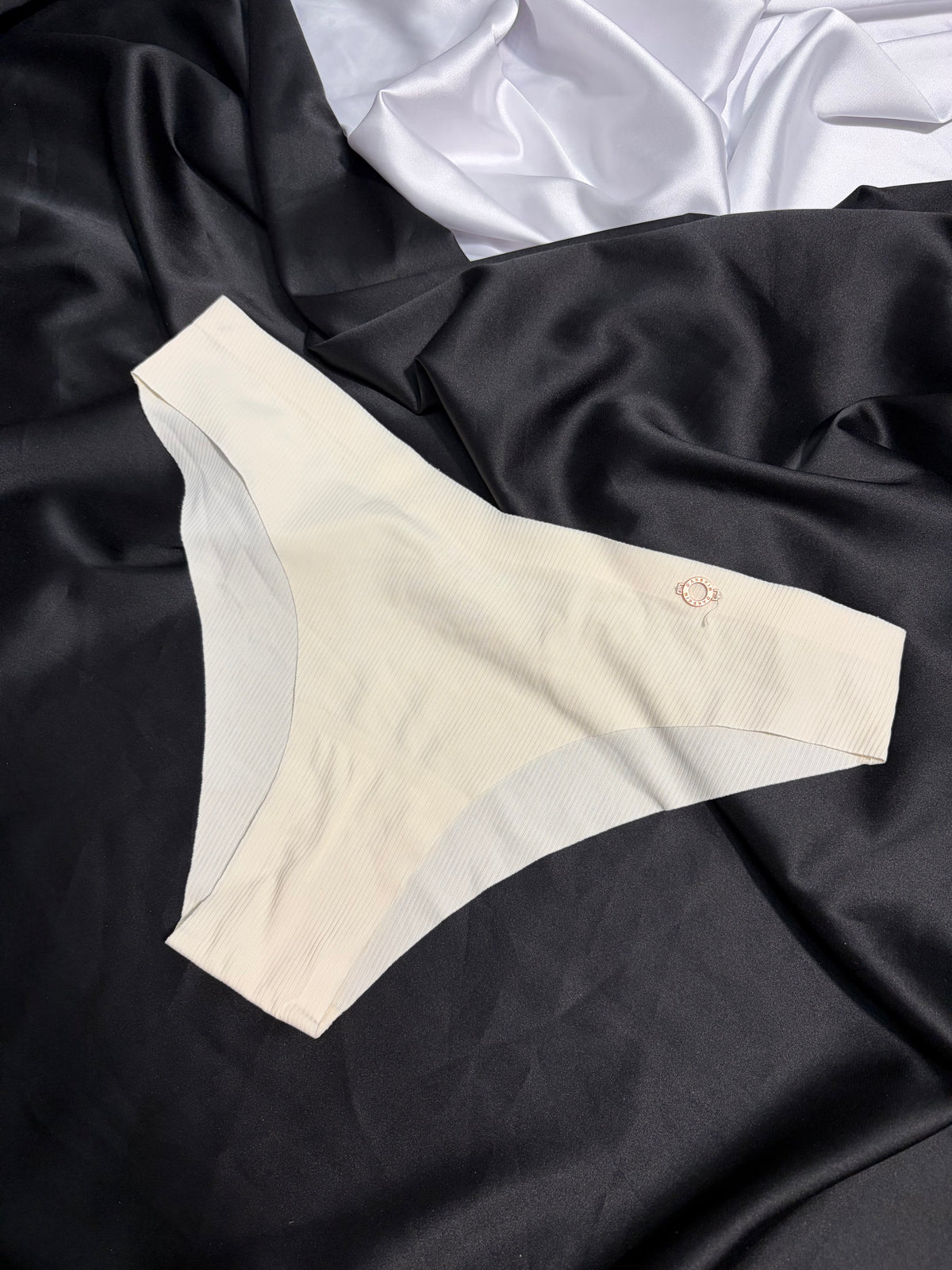 Danskin laser cut V shape